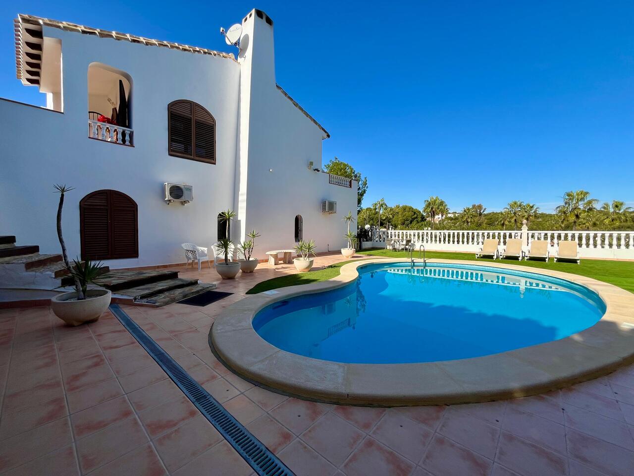 Pool area in villa for sale in Villamartin