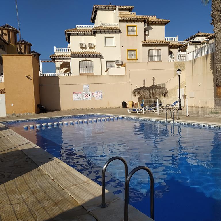 Pool area in apartment for sale in Orihuela Costa