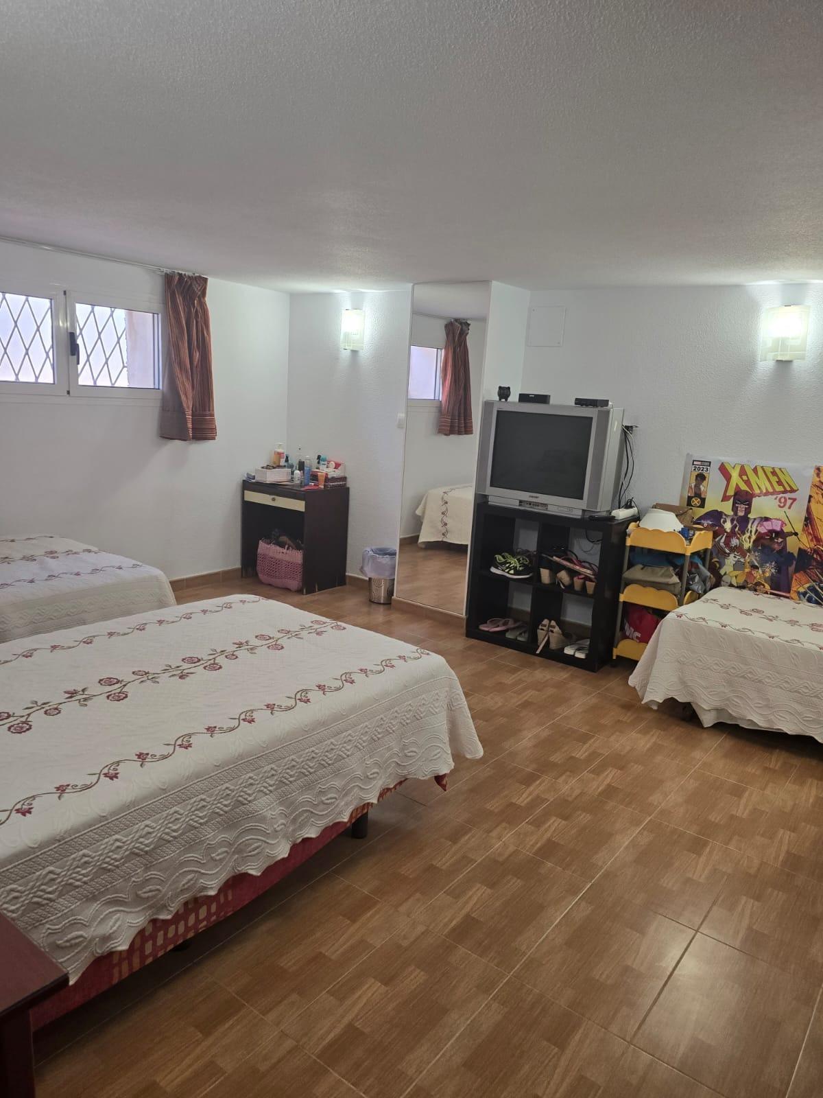 Master bedroom in villa for sale in Orihuela Costa