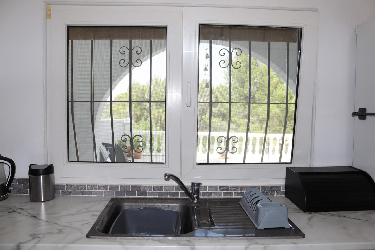 Pool area in villa for sale in Parcent