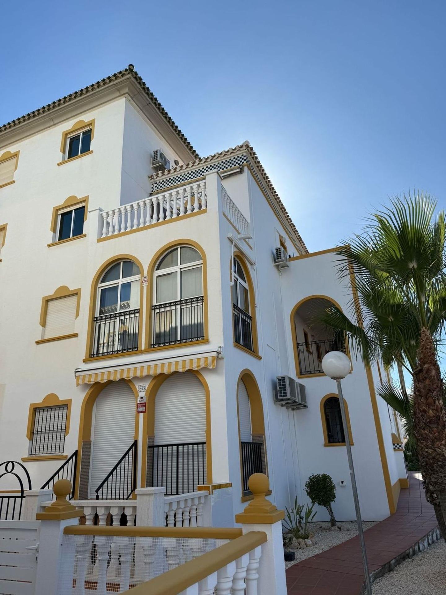 Pool area in bungalow for sale in Torrevieja