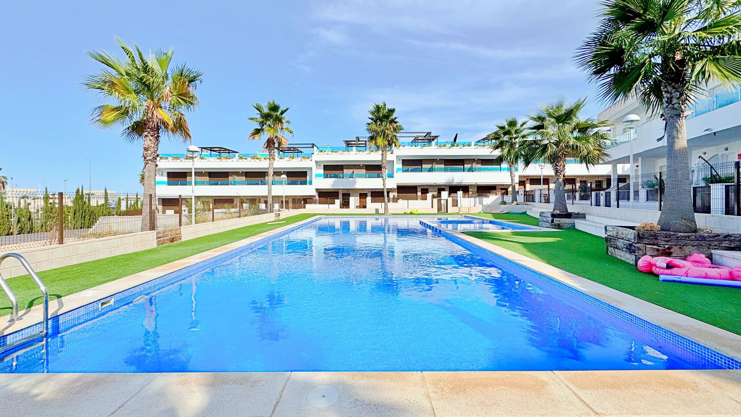 This three-bedroom, three-bathroom duplex townhouse is located in the exclusive residential area of