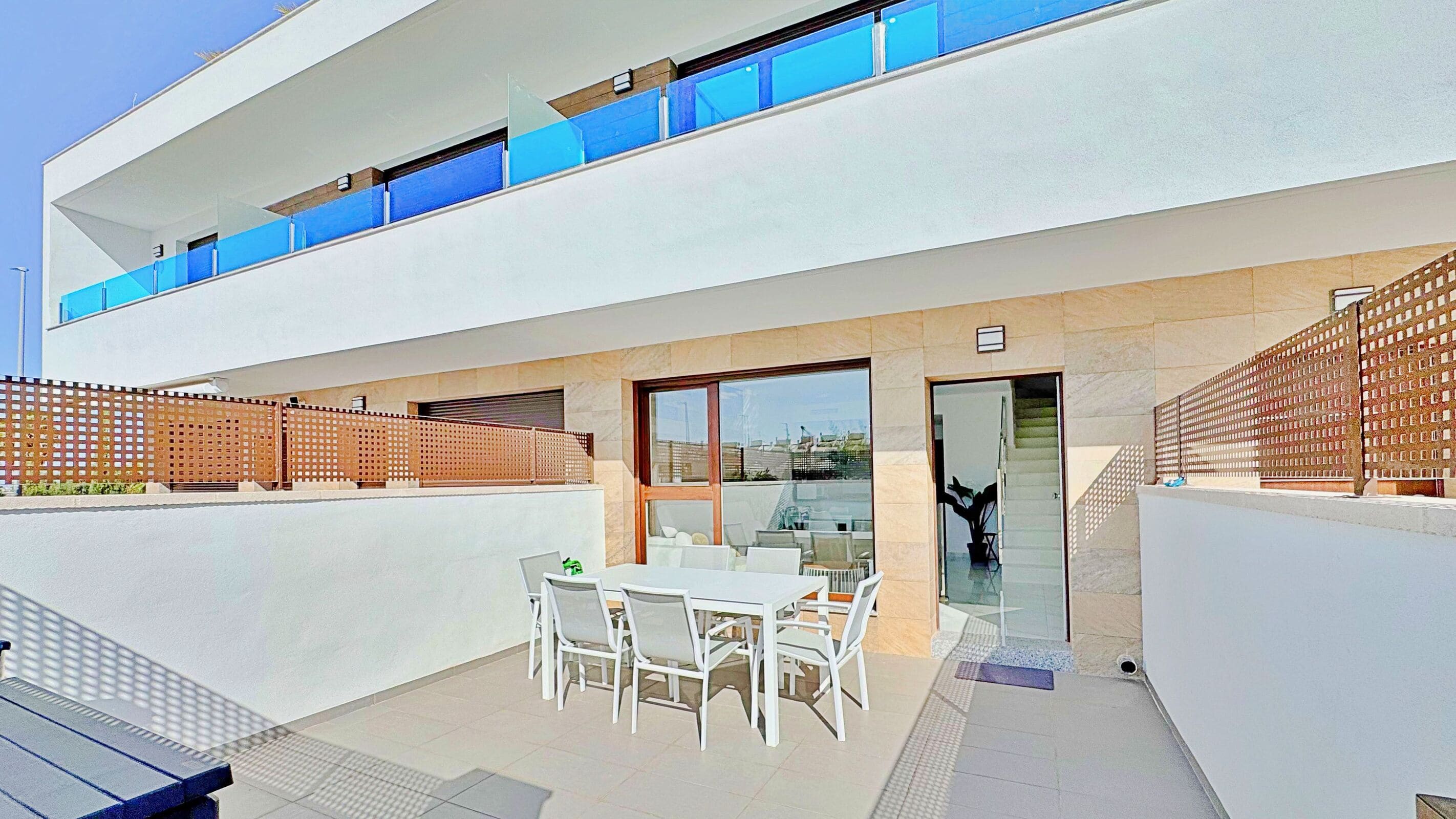 This three-bedroom, three-bathroom duplex townhouse is located in the exclusive residential area of