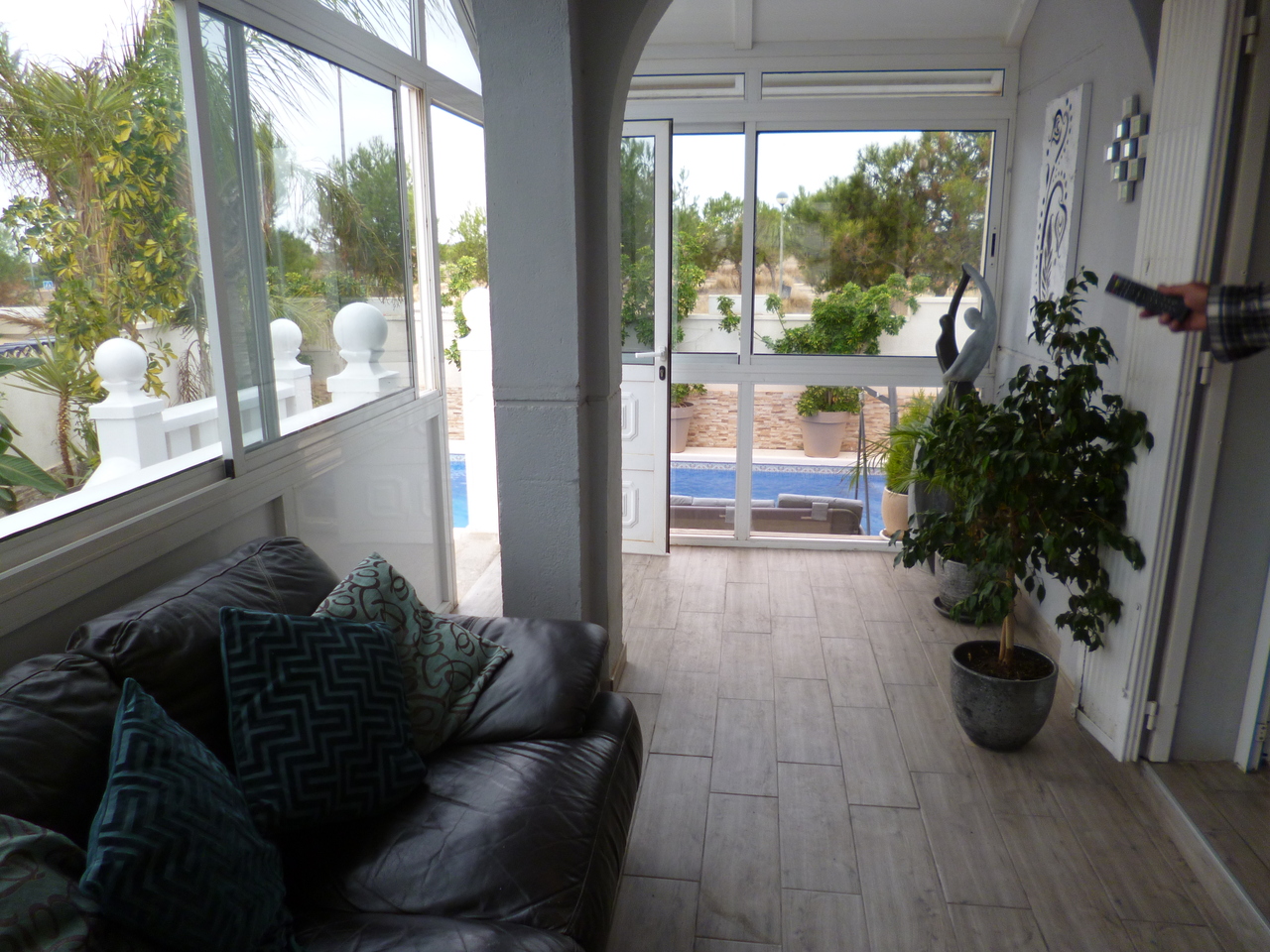 Pool area in villa for sale in Playa Flamenca