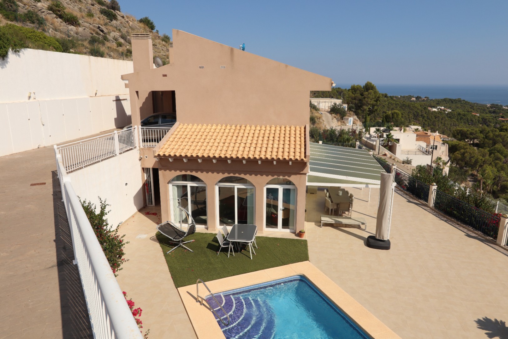 Pool area in villa for sale in Altea