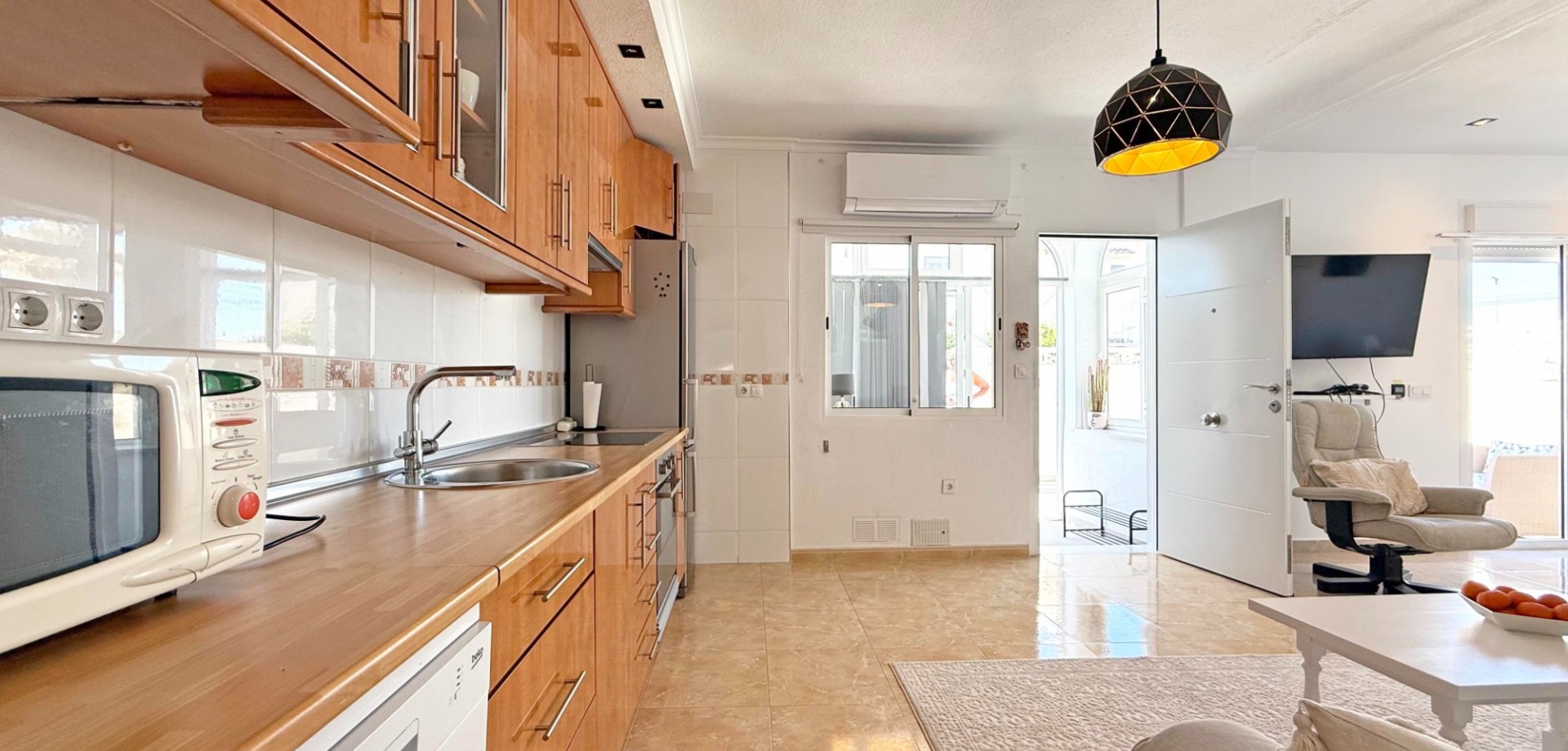 Pool area in bungalow for sale in Torrevieja