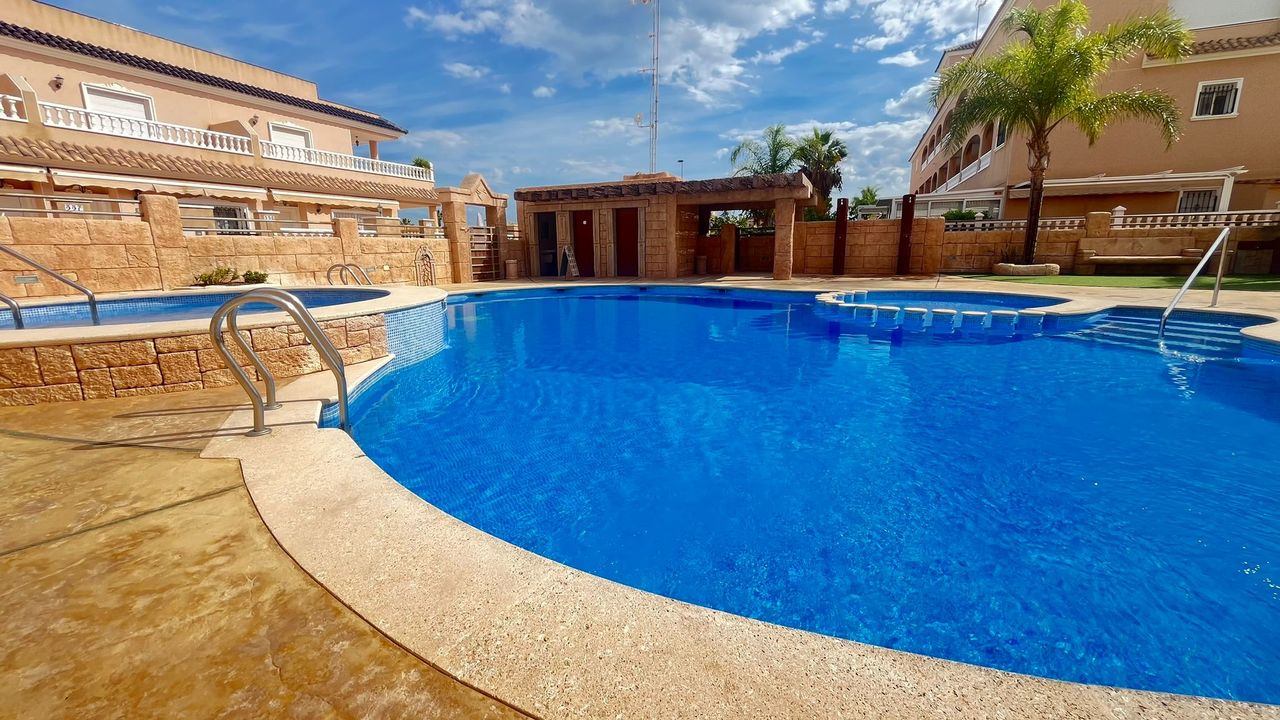 This impressive apartment features three spacious bedrooms with built-in wardrobes, along with the p