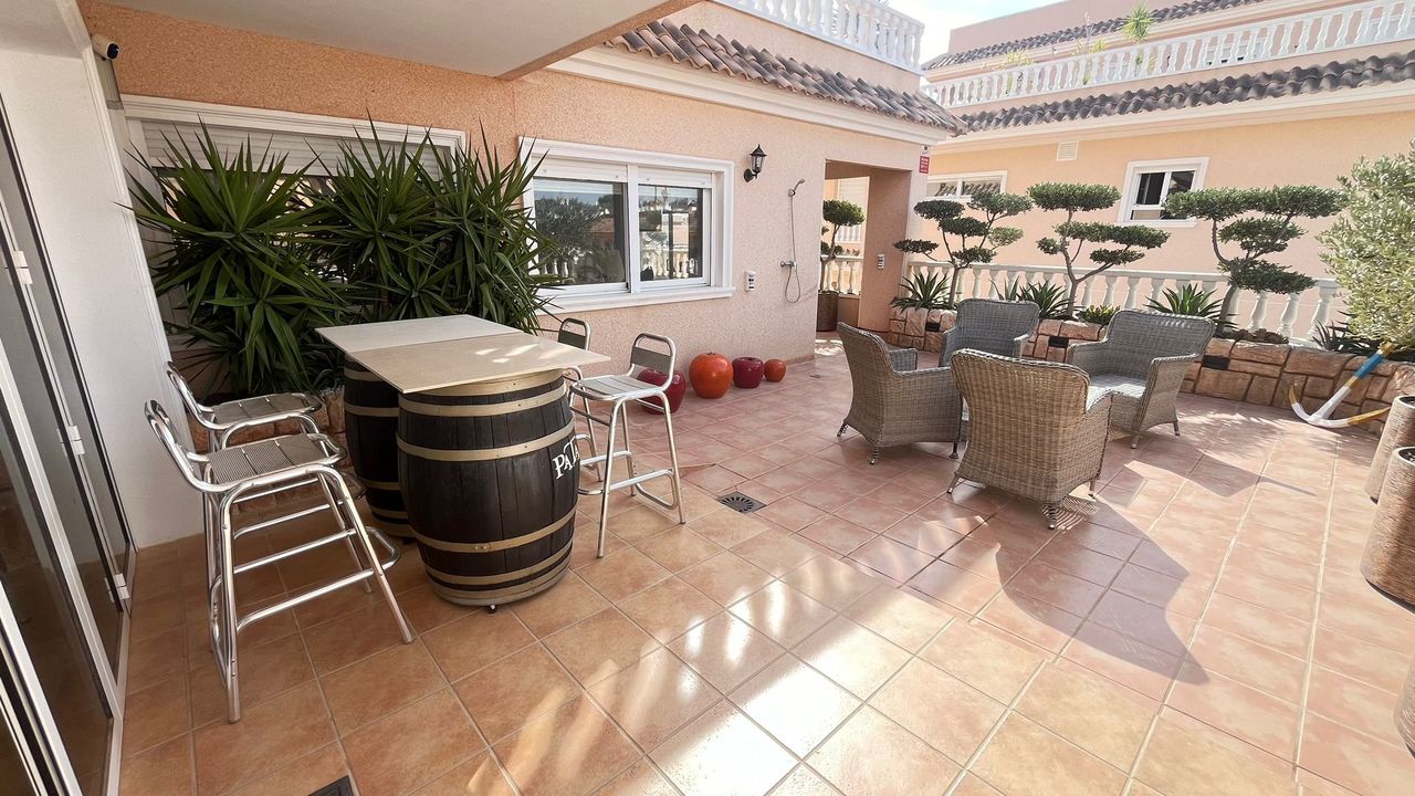 This impressive apartment features three spacious bedrooms with built-in wardrobes, along with the p