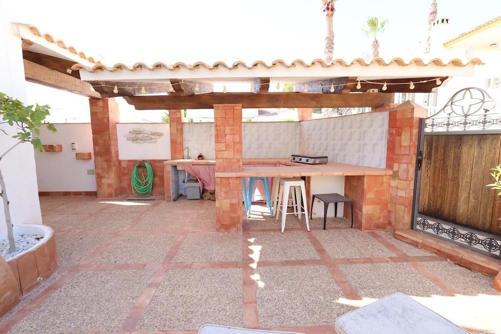 Pool area in villa for sale in Orihuela Costa