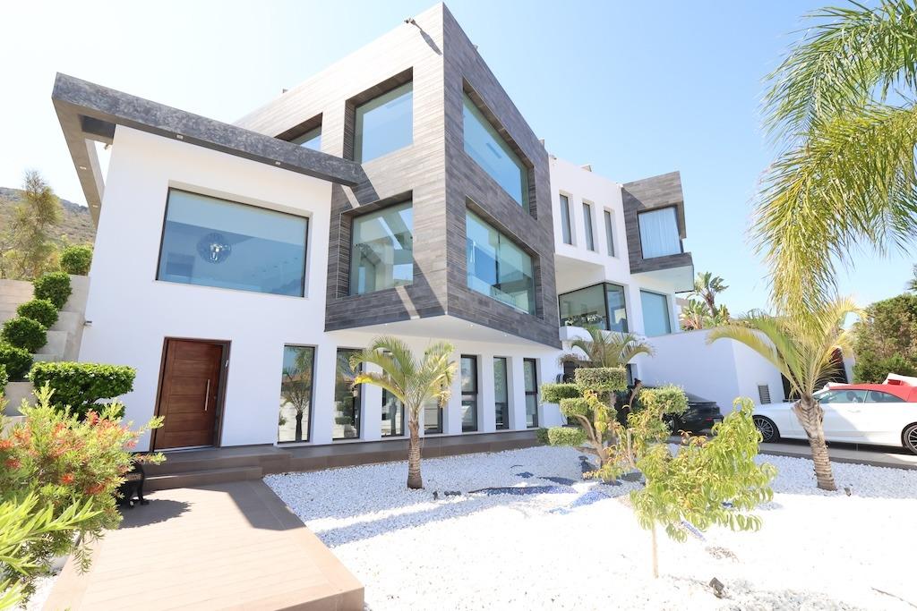 Discover the essence of modern luxury at Villa High, a stunning residence located in the exclusive M