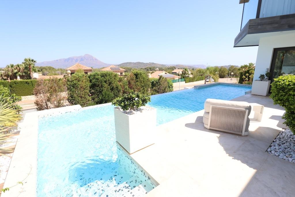 Discover the essence of modern luxury at Villa High, a stunning residence located in the exclusive M