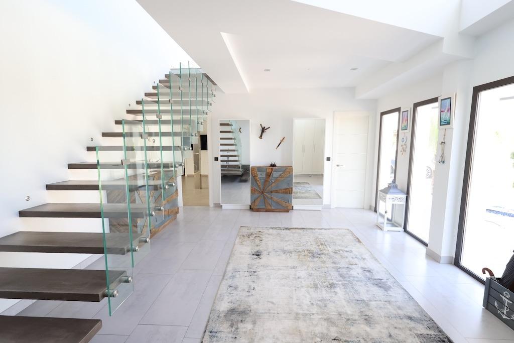 Discover the essence of modern luxury at Villa High, a stunning residence located in the exclusive M