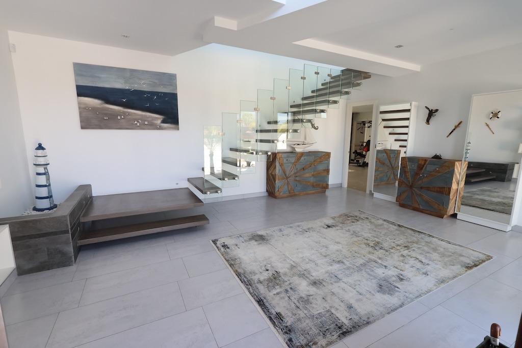 Discover the essence of modern luxury at Villa High, a stunning residence located in the exclusive M