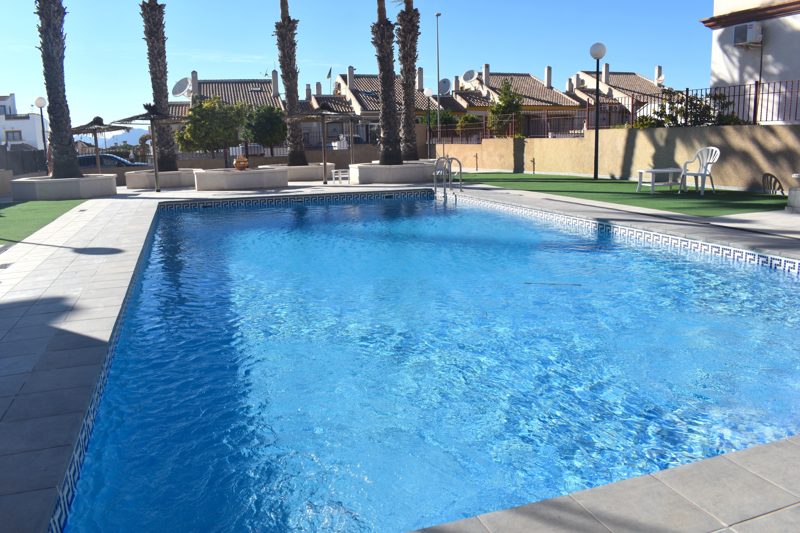 Pool area in villa for sale in San Fulgencio