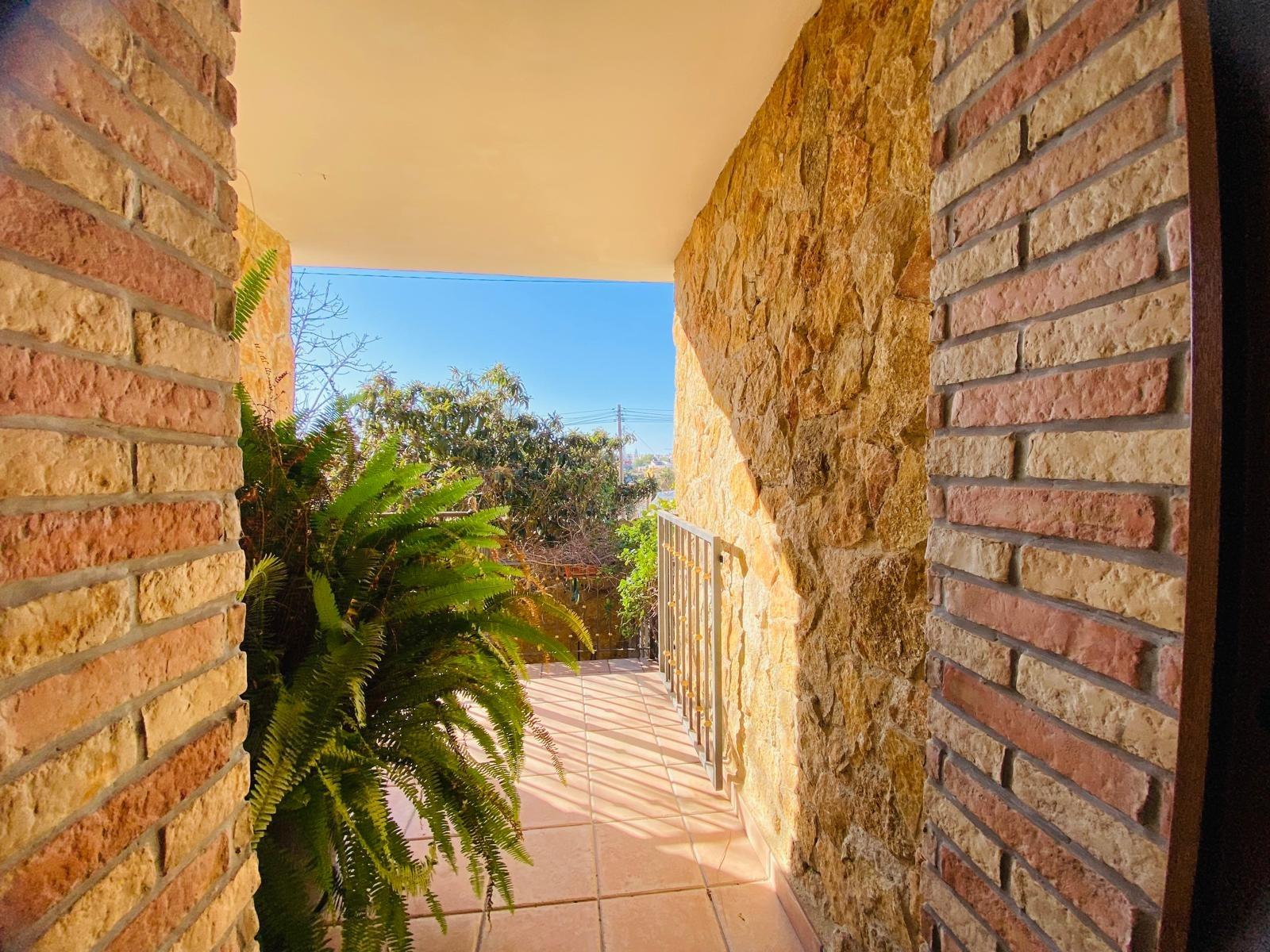 Discover this magnificent property spread over three levels: semi-basement, ground floor, and first