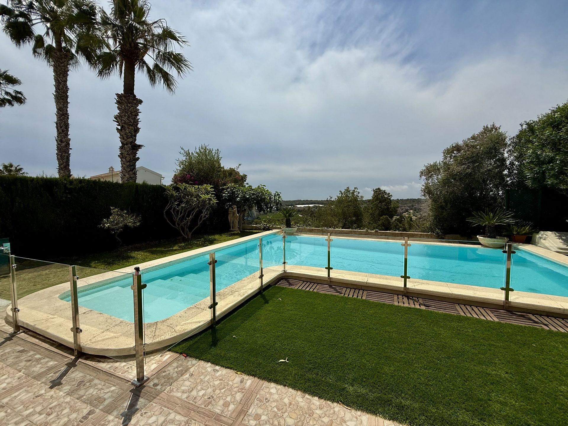 Pool area in villa for sale in Orihuela Costa