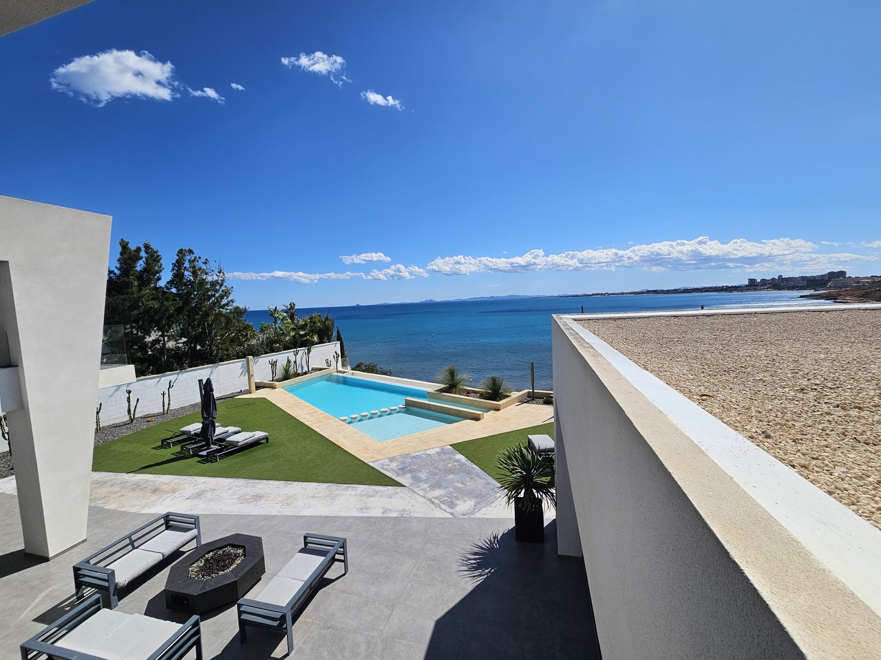 Pool area in villa for sale in Cabo Roig