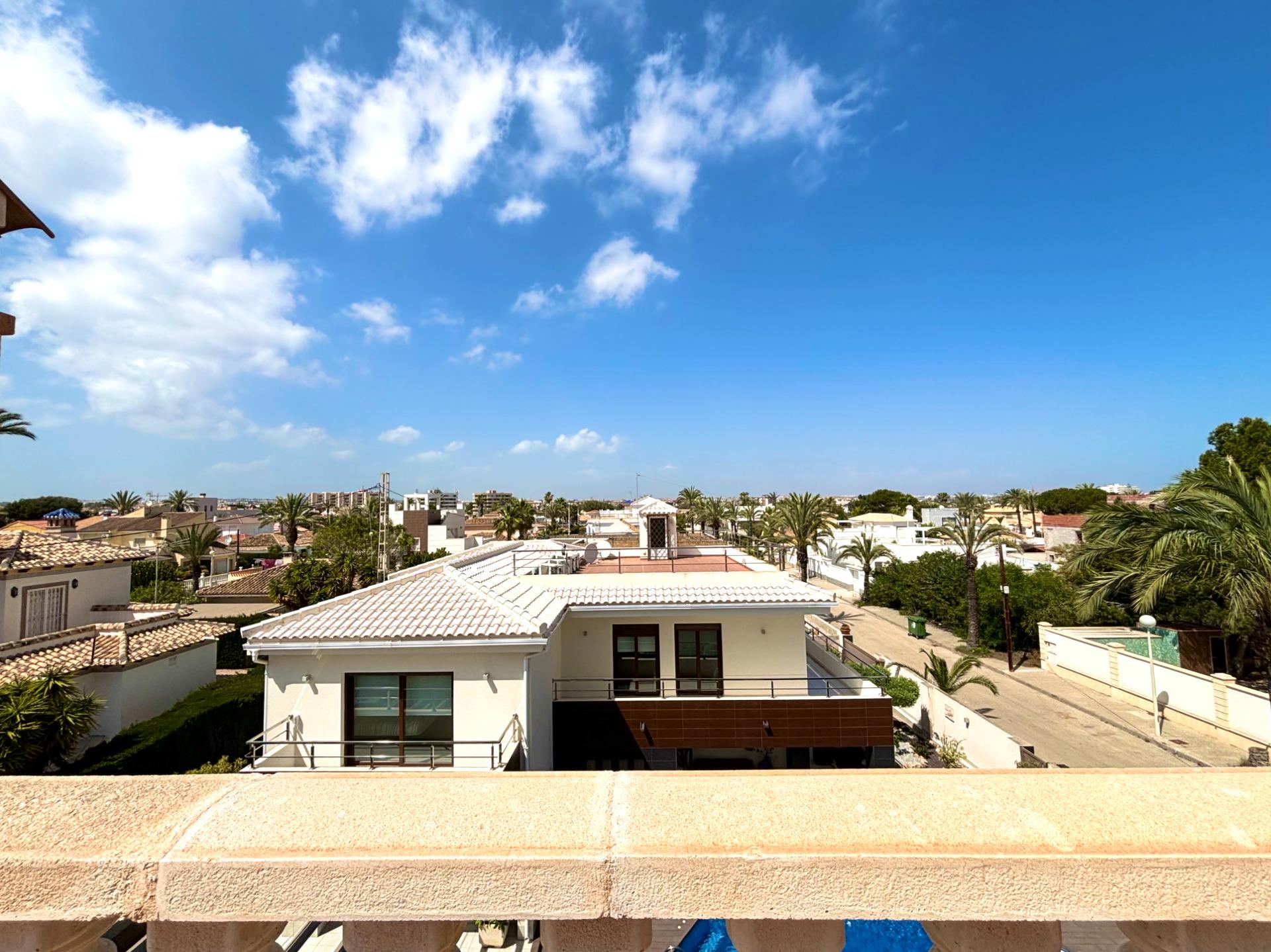 Living room in villa for sale in Cabo Roig