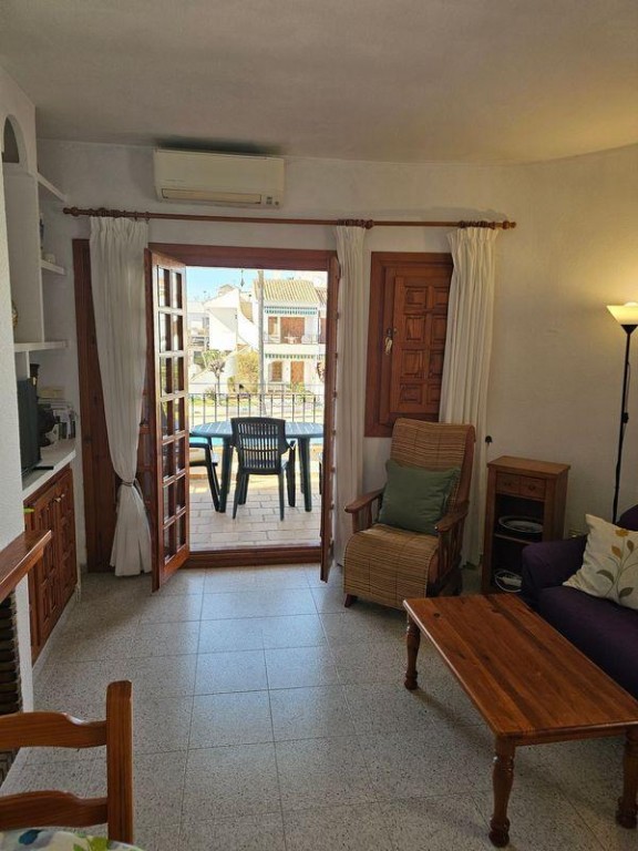 Discover your perfect oasis in this charming townhouse bungalow