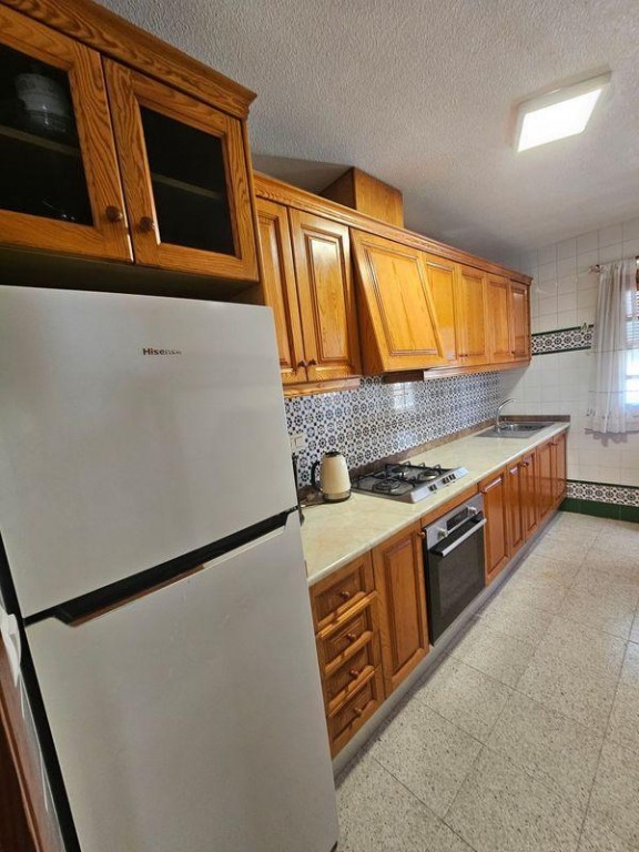 Discover your perfect oasis in this charming townhouse bungalow