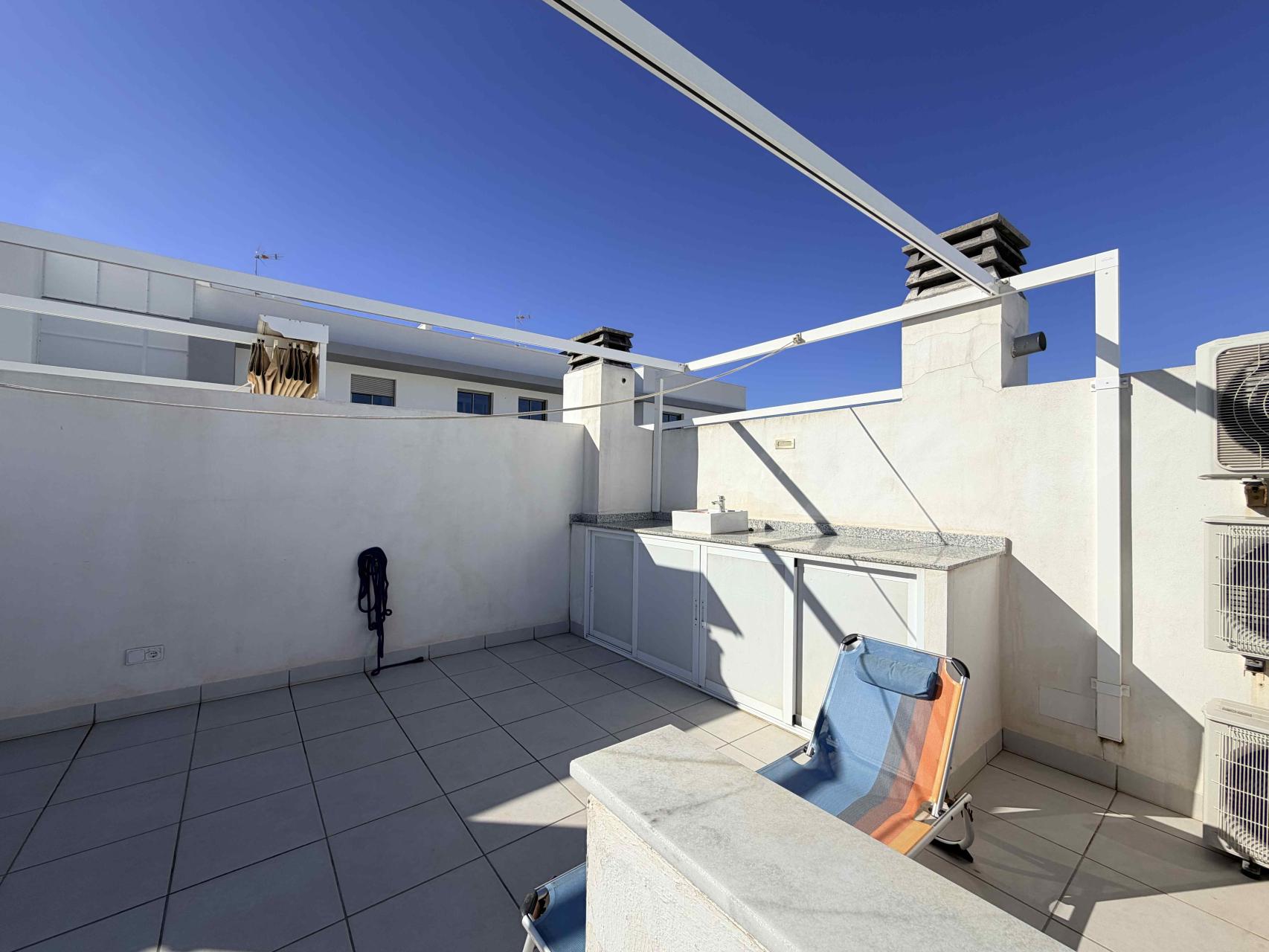 Pool area in terraced for sale in Cabo Roig