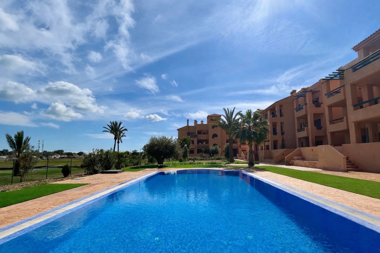 This stunning frontline ground-floor apartment is located in the prestigious La Serena Golf resort,