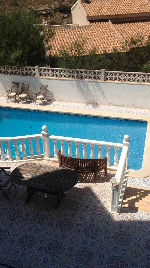 Master bedroom in villa for sale in Rojales