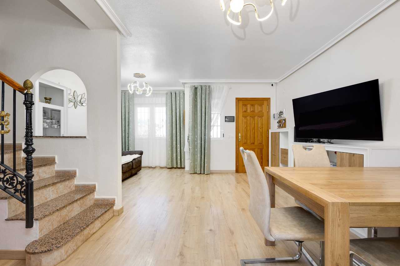 This bright and beautifully renovated 3-bedroom, 2-bathroom townhouse is perfectly located in the vi