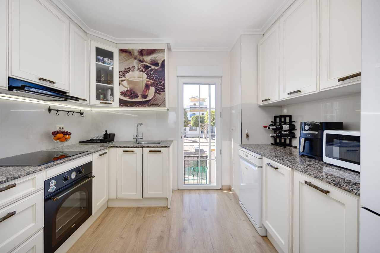 This bright and beautifully renovated 3-bedroom, 2-bathroom townhouse is perfectly located in the vi