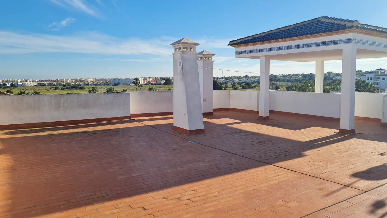 Living room in penthouse for sale in Villamartin