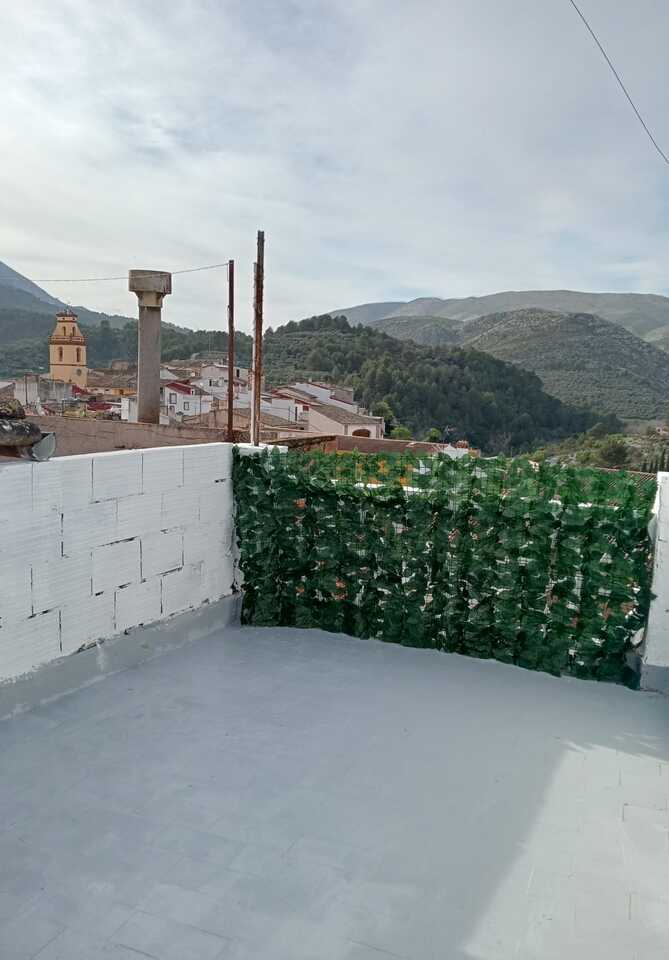 Master bedroom in terraced for sale in Castell de Castells