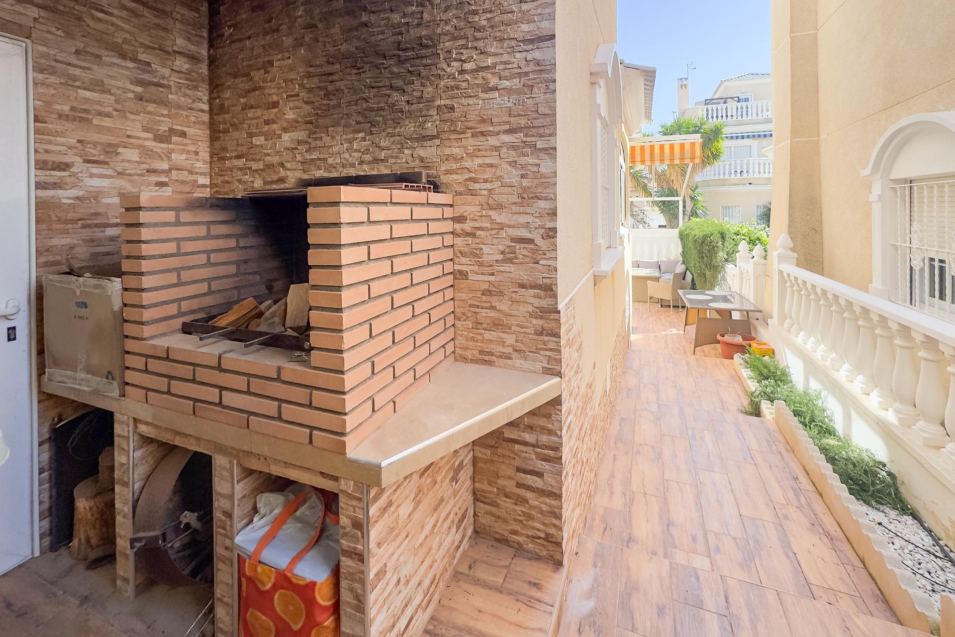 Pool area in villa for sale in Orihuela Costa