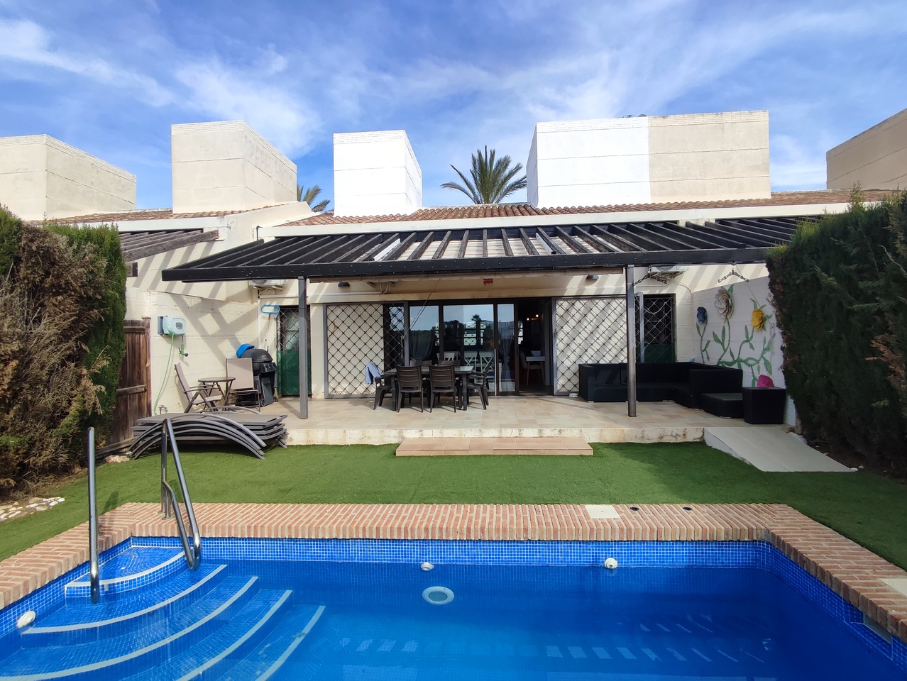 RESALE VILLA - A modern contemporary designed two-bedroom villa with high wooden ceilings, attractiv