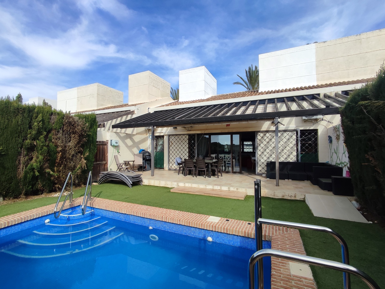 Pool area in villa for sale in Peraleja Golf