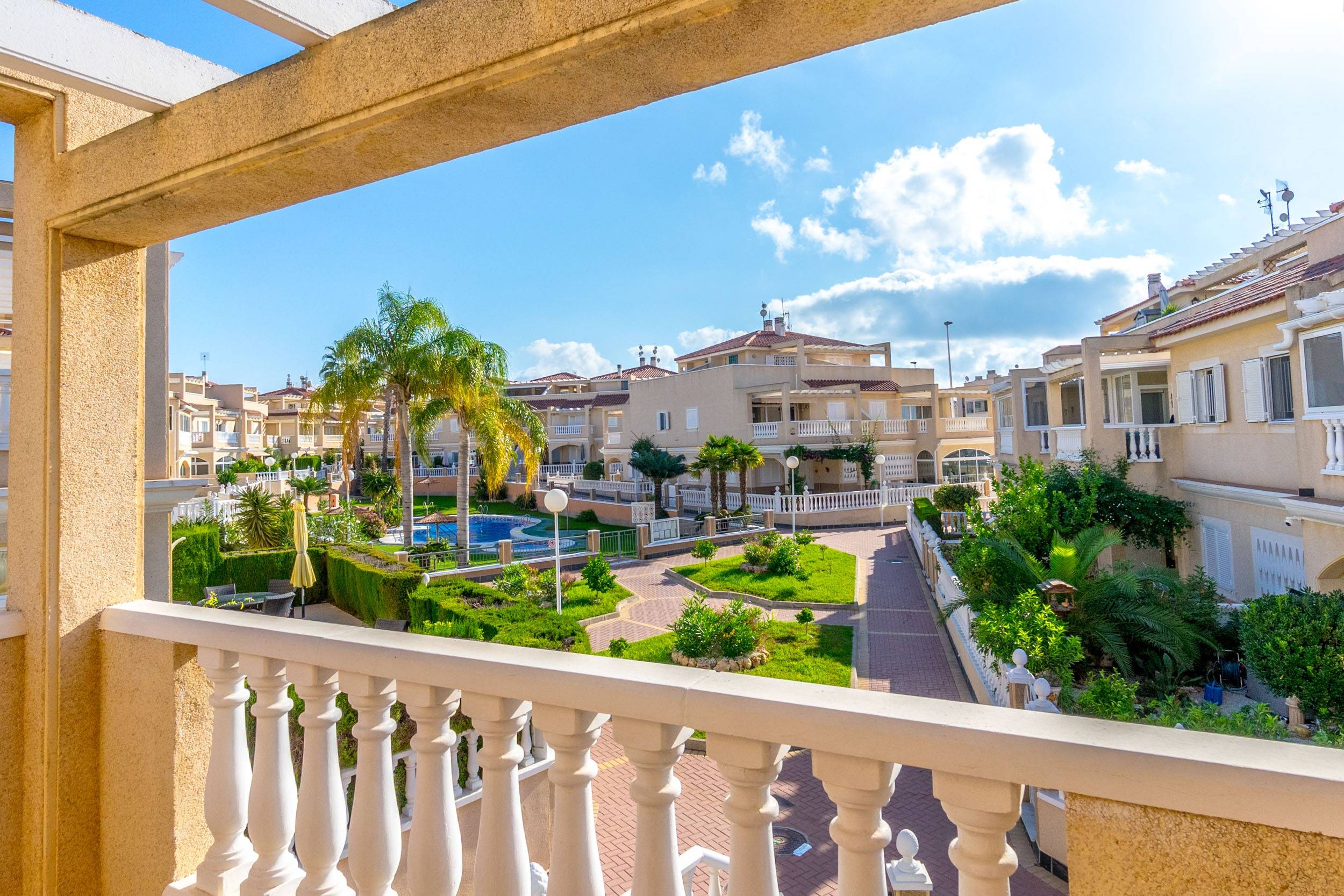 Pool area in duplex for sale in Orihuela Costa