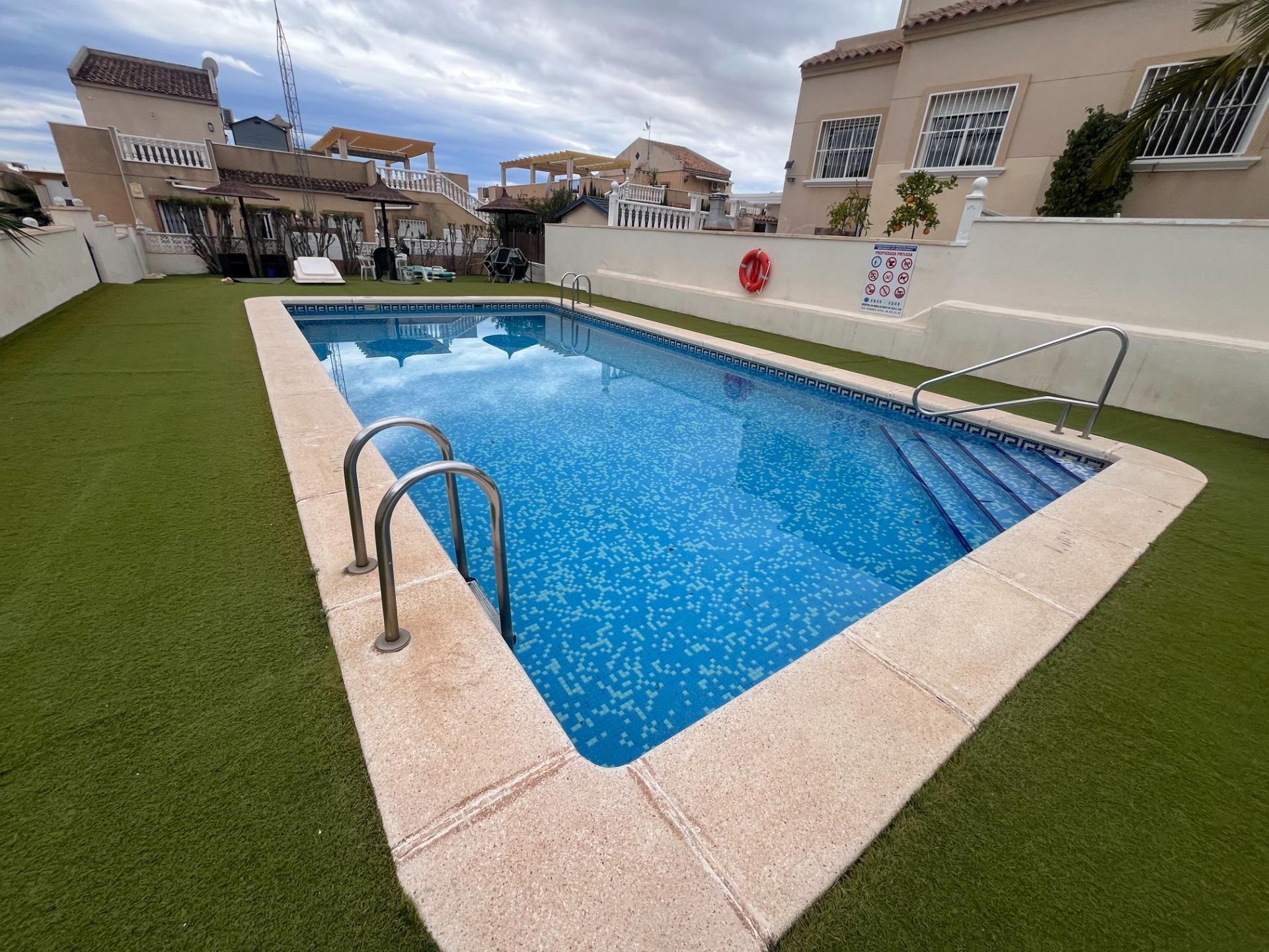 Pool area in duplex for sale in San Miguel de Salinas