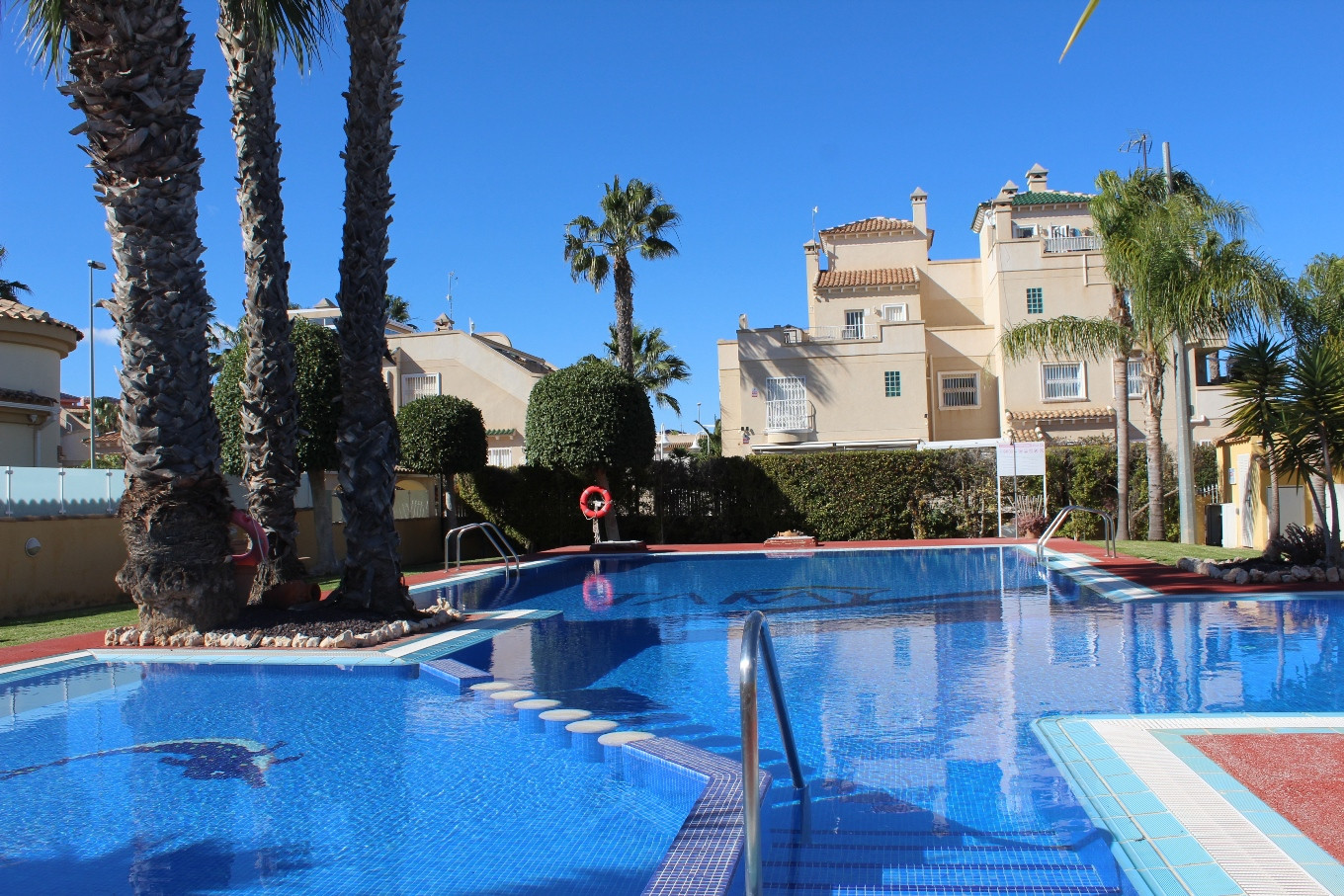 Pool area in villa for sale in Villamartin