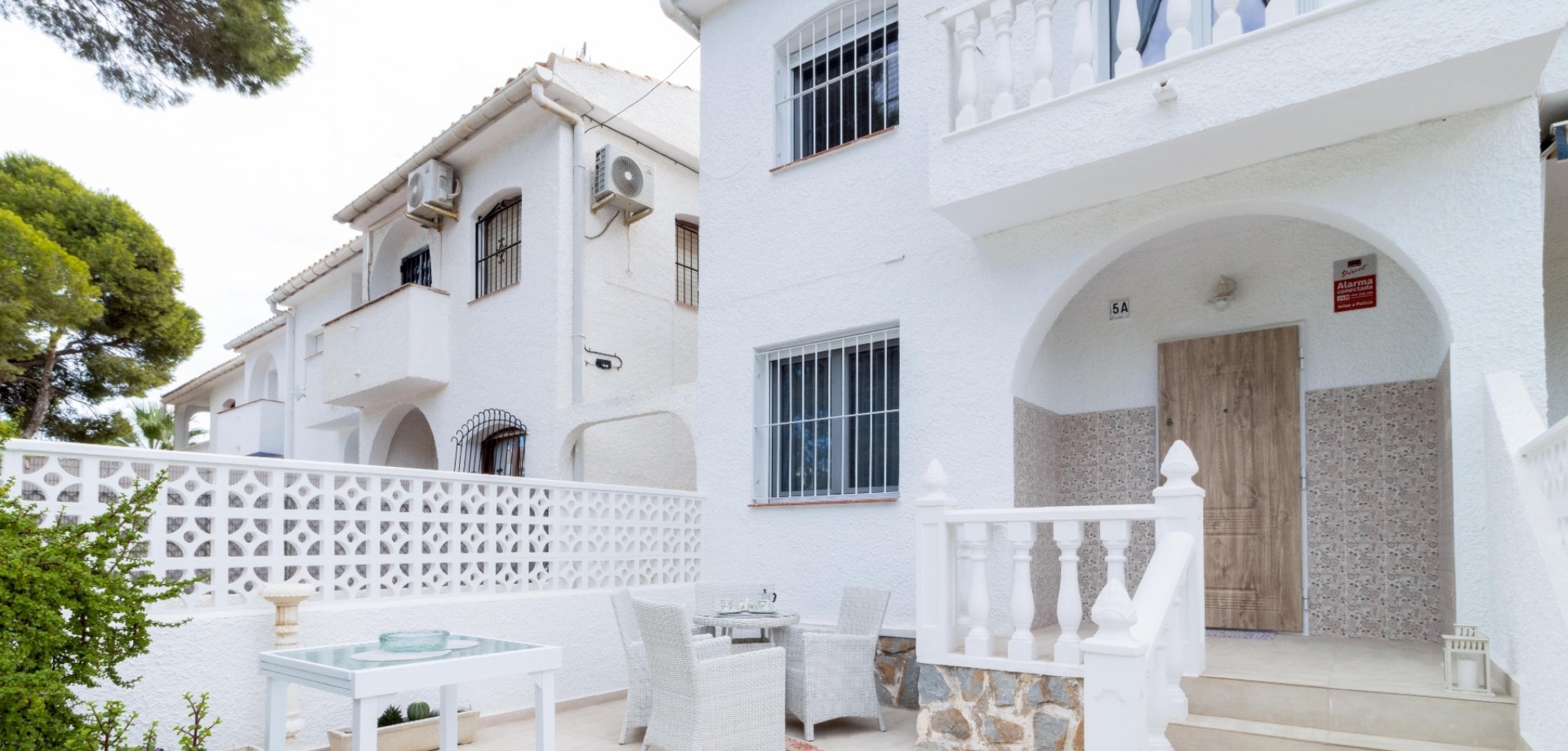 Welcome to this fully renovated townhouse located in the very heart of La Zenia, set directly within