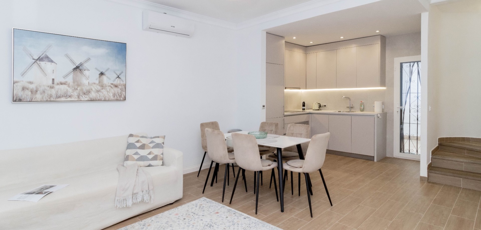 Welcome to this fully renovated townhouse located in the very heart of La Zenia, set directly within