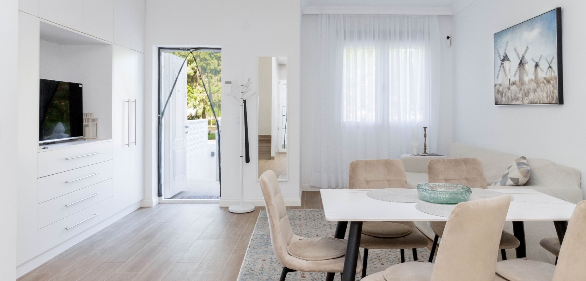 Welcome to this fully renovated townhouse located in the very heart of La Zenia, set directly within