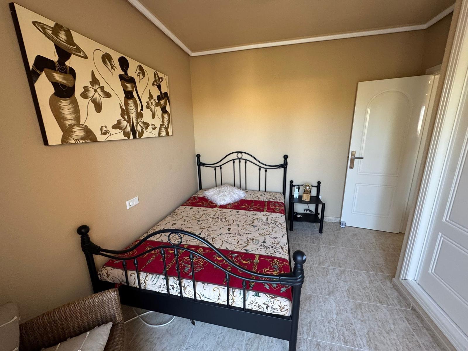Master bedroom in terraced for sale in Rojales