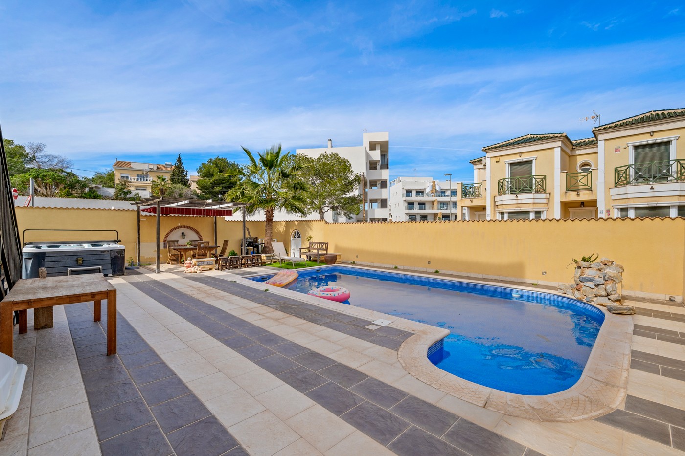 Pool area in villa for sale in Orihuela Costa