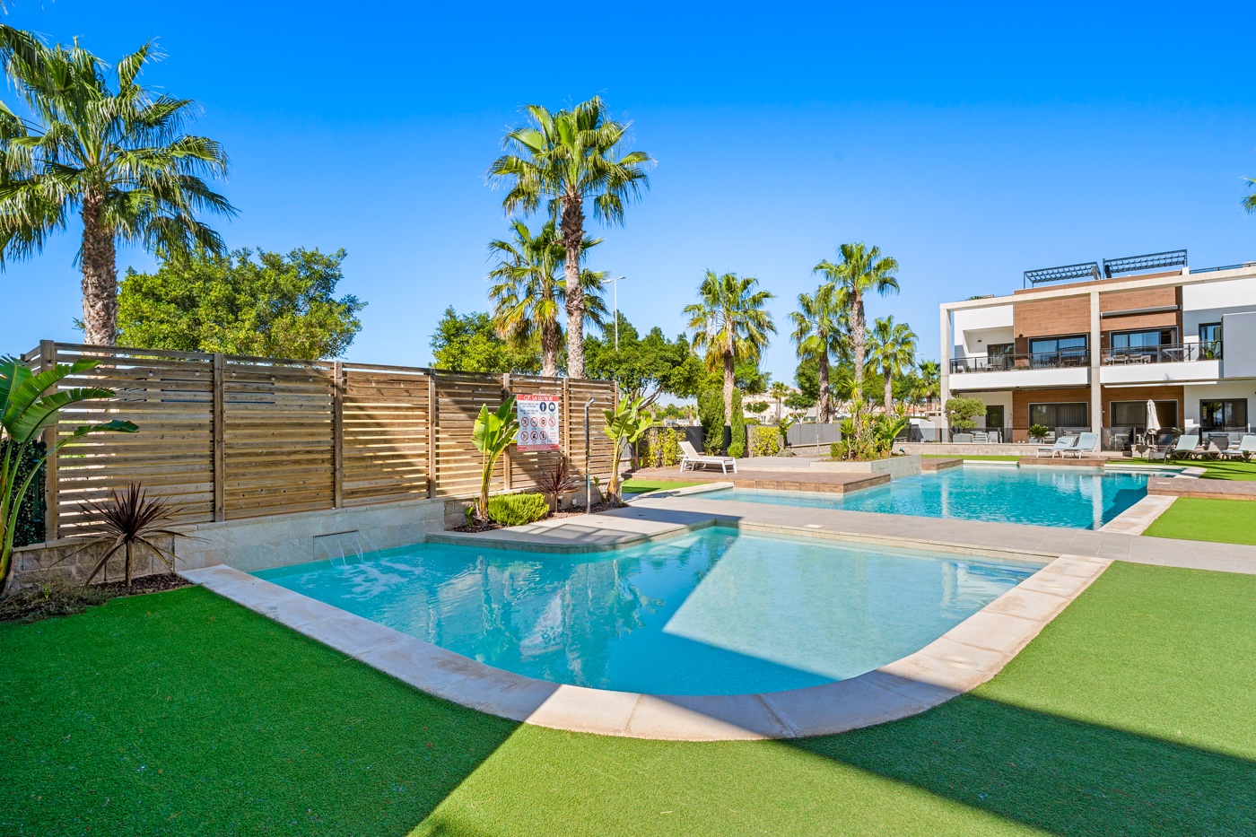 Pool area in apartment for sale in Guardamar del Segura