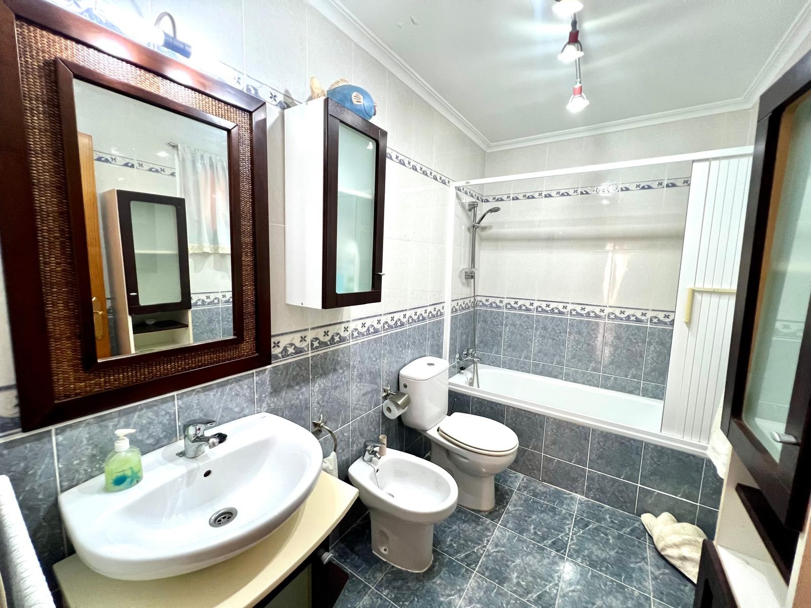 This well-maintained two-story semi-detached home in the town of Pinoso offers comfortable living wi