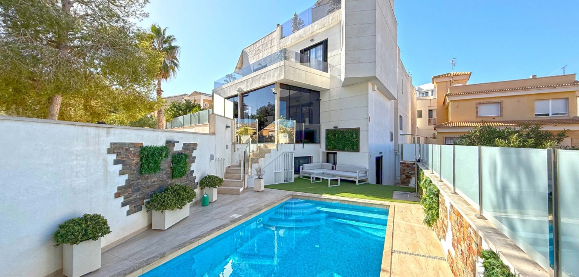 This stunning corner villa, nestled at the end of a peaceful cul-de-sac in the sought-after area of
