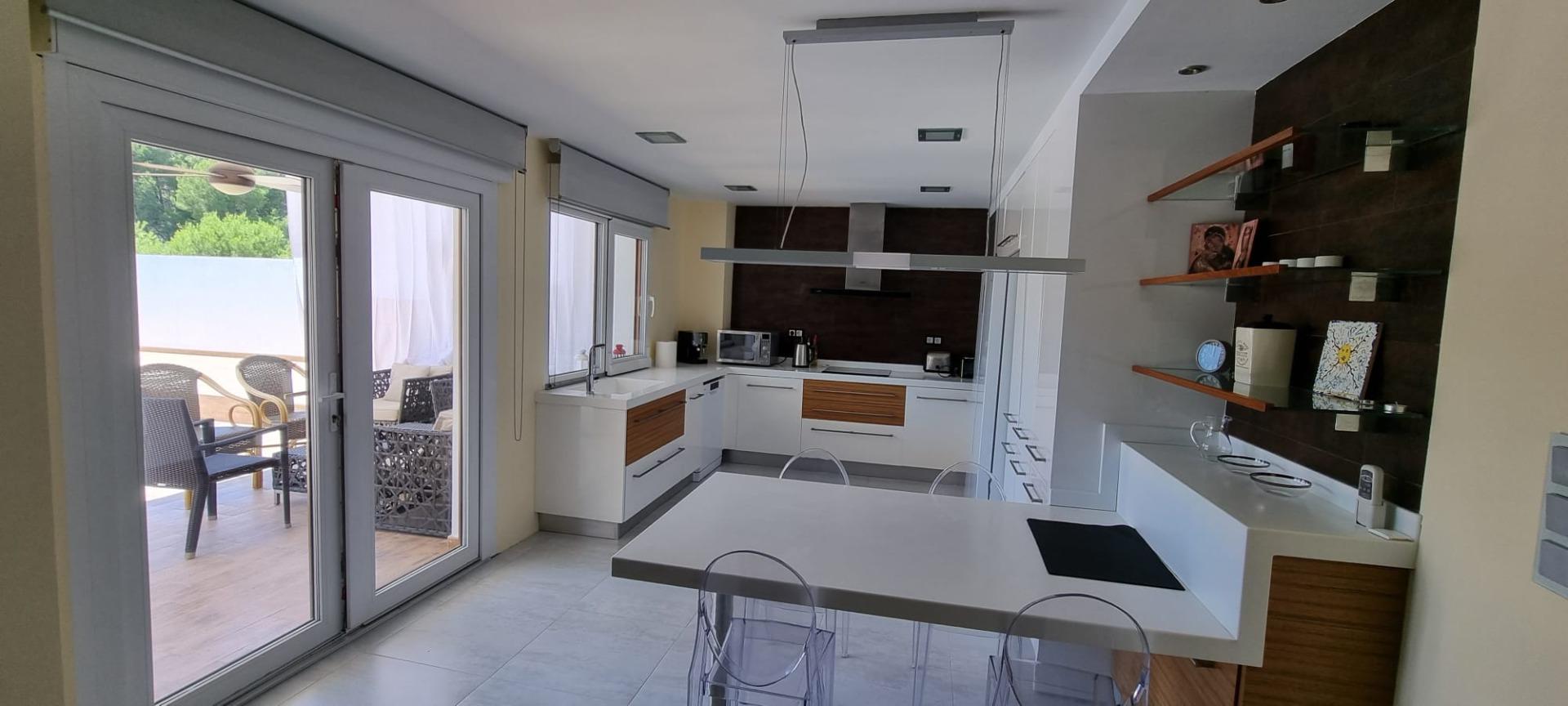 Pool area in villa for sale in Altea