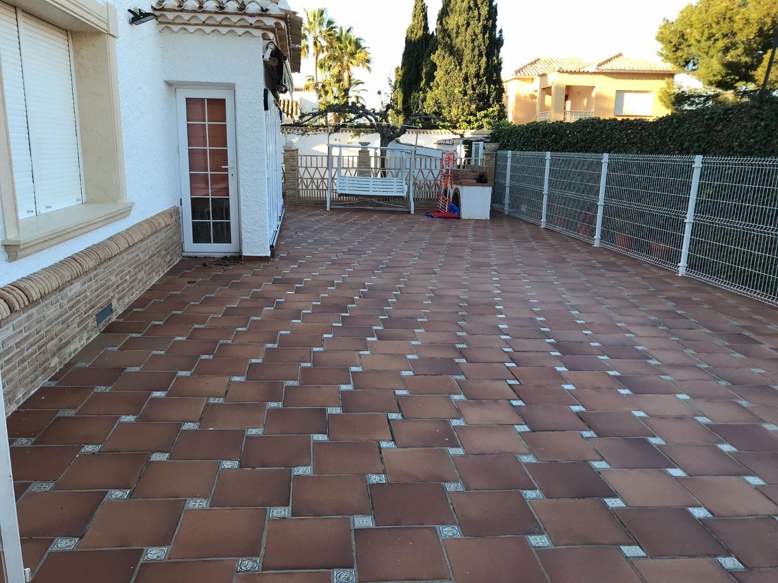 Pool area in villa for sale in Orihuela Costa