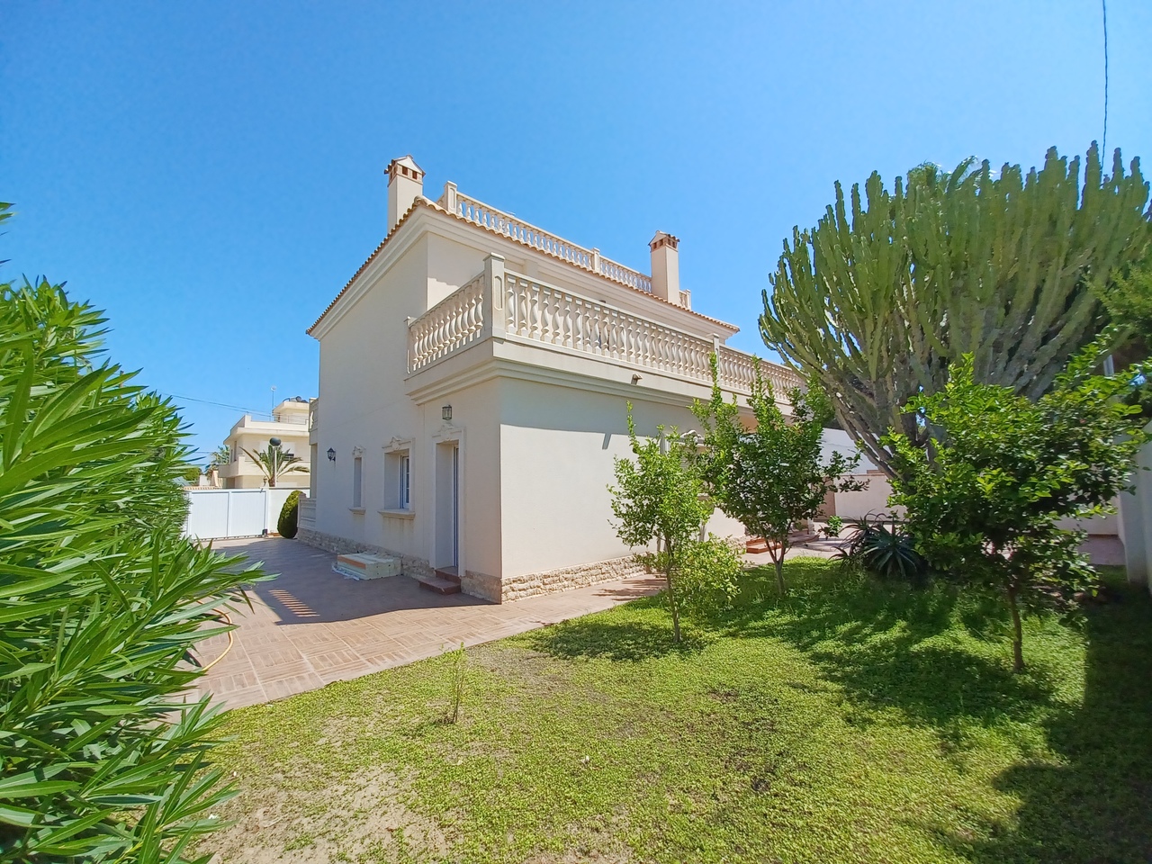 Pool area in villa for sale in Cabo Roig