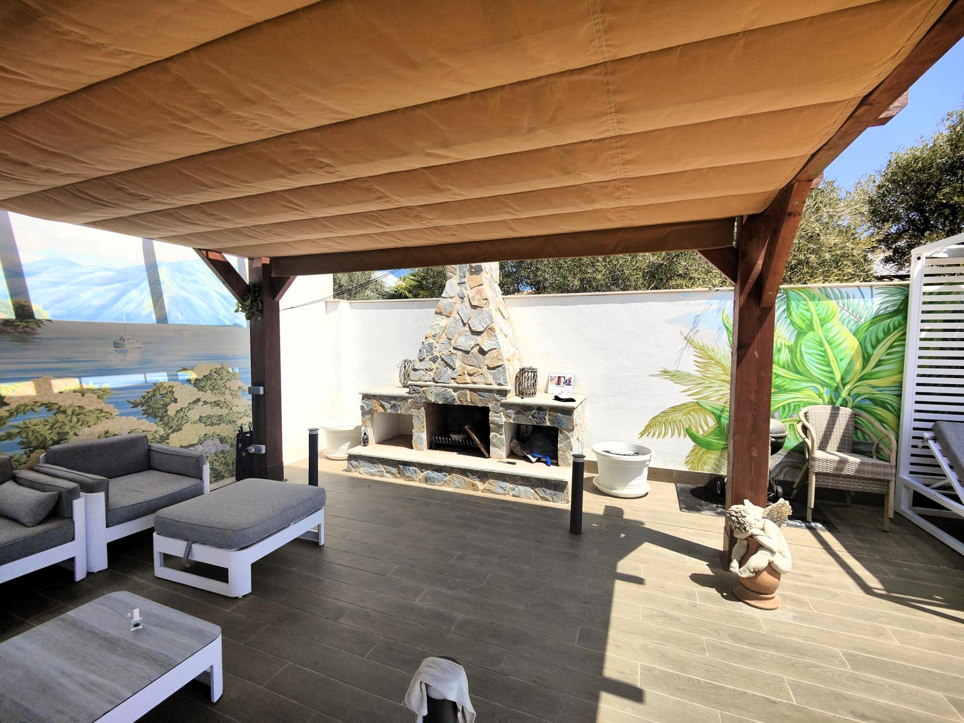 Pool area in villa for sale in Cabo Roig