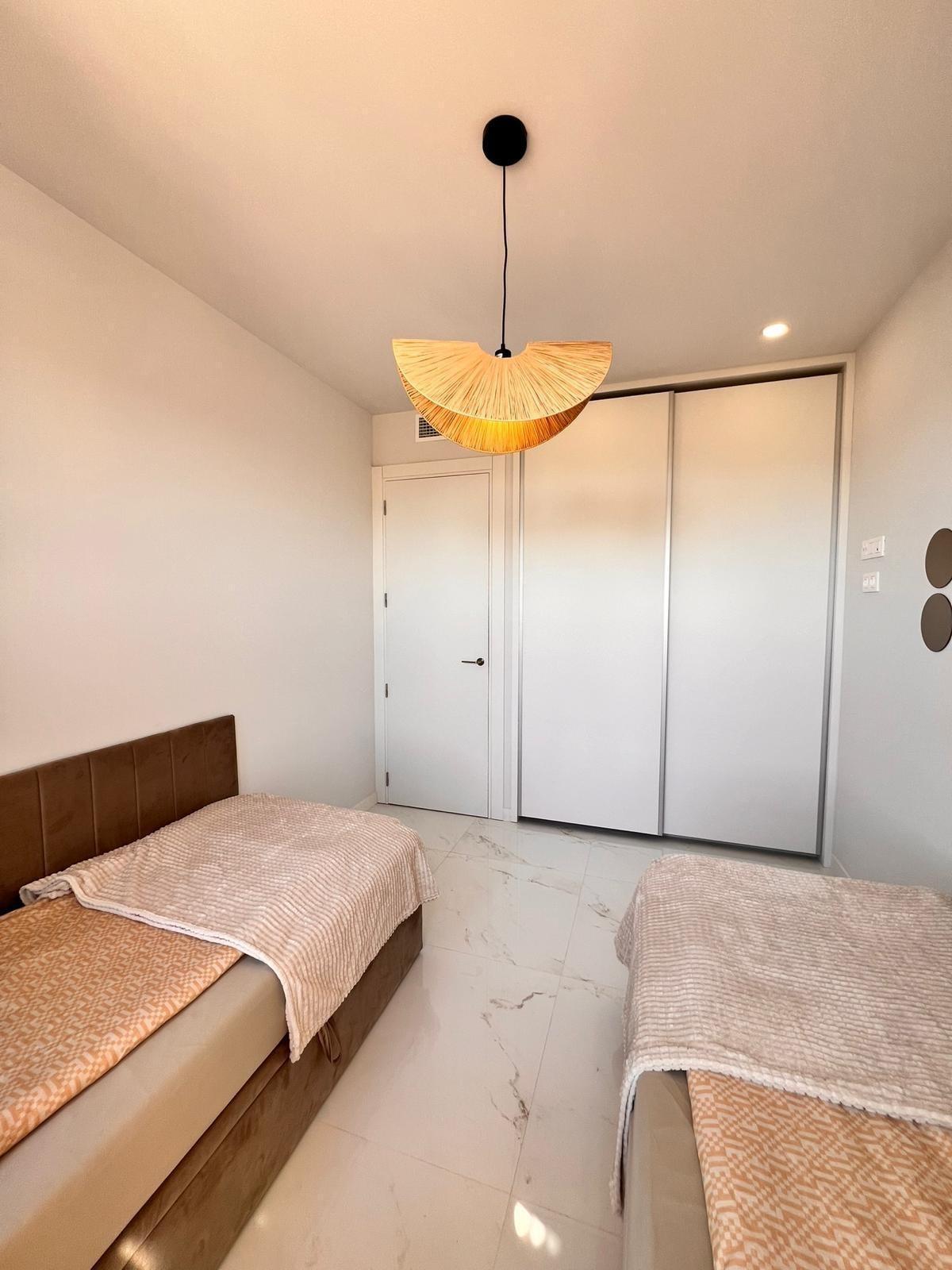 Pool area in apartment for sale in Benidorm